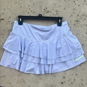 Women's Light Blue Ruffled Skirt
Lucky in Love brand 
Neon stripe at bottom